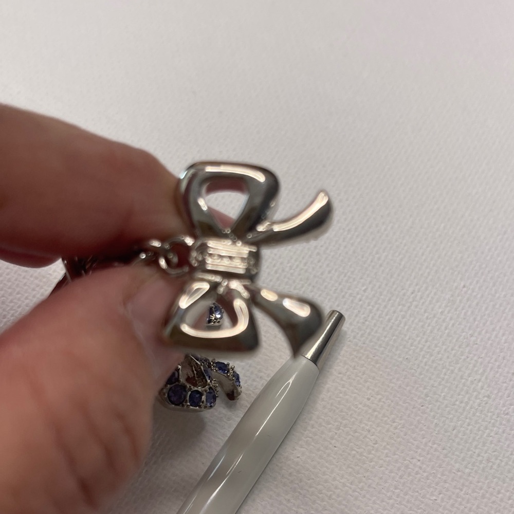 Elegant Coach Bow Keychain with Multicolor Crystals and a White Coach Pen - Picture 5 of 6